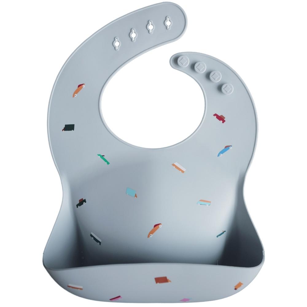 Mushie - Bavoir à poche en silicone