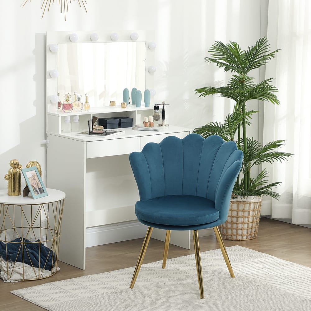 Fauteuil coquillage pieds métal doré velours bleu