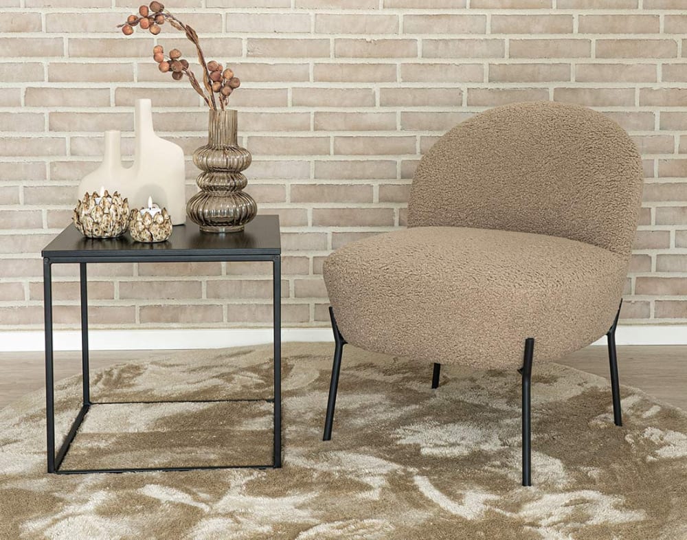 Fauteuil en tissu bouclette beige