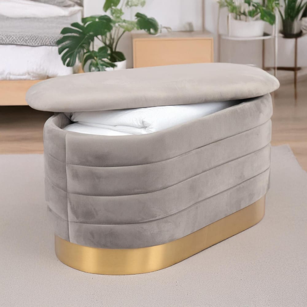 Banquette-coffre moderne matelassée avec base dorée velours gris clair