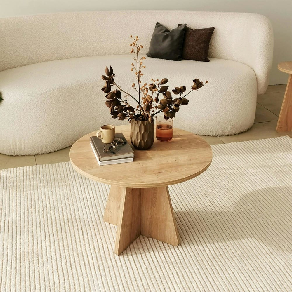 Table basse ronde pied trapèze décor bois clair