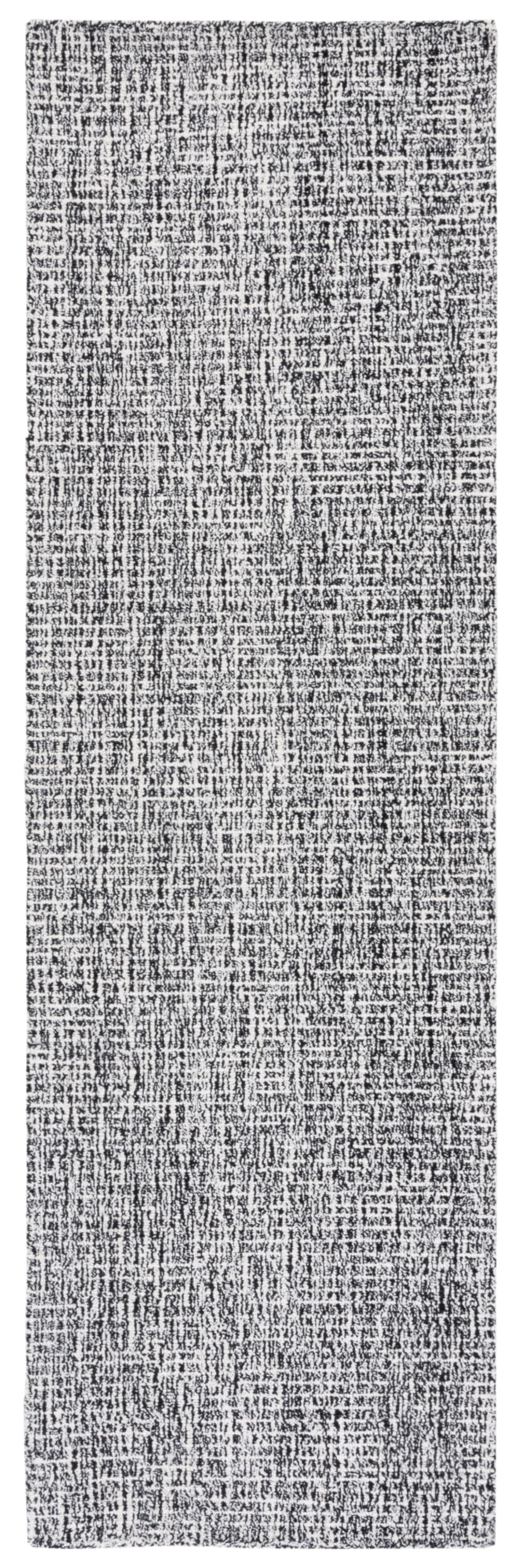 Tapis contemporain en laine noir/blanc, 69 x 122 cm