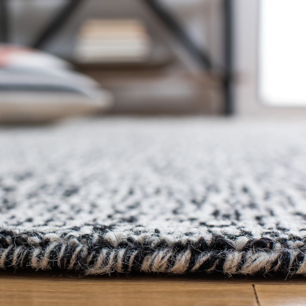 Tapis contemporain en laine noir/blanc, 69 x 122 cm — vue 3