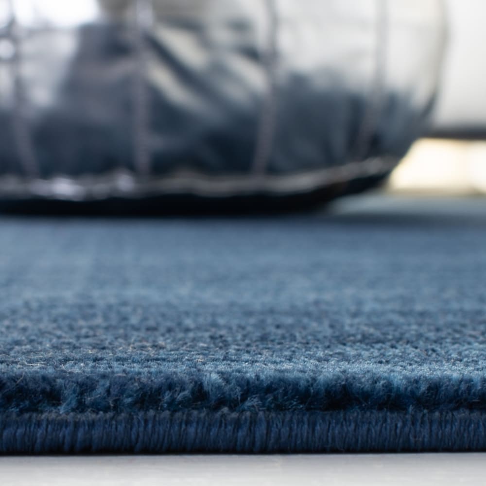 Tapis solide et tonale en polypropylène bleu, 66 x 122 cm — vue 4