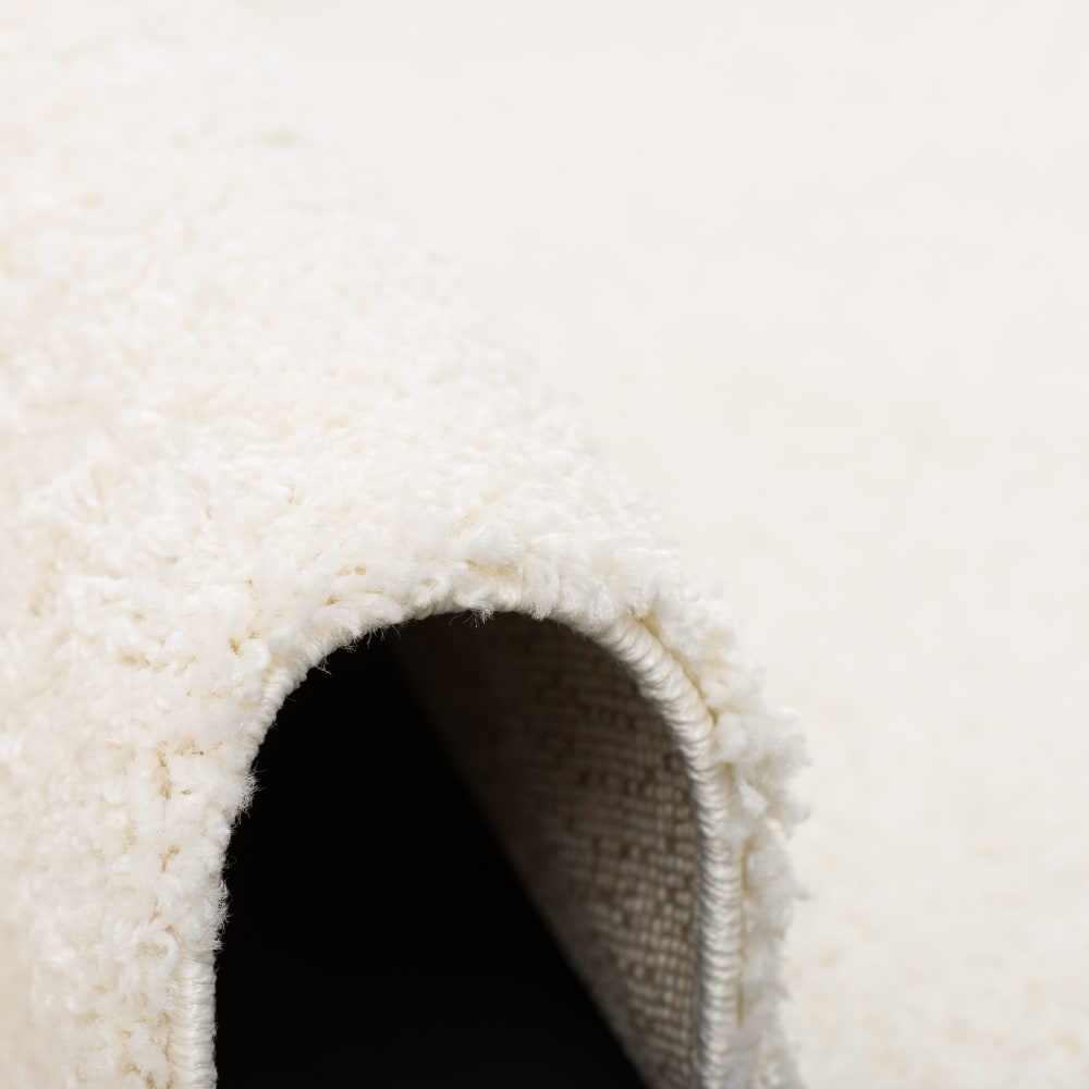 Tapis shaggy uni blanc 120x170 cm — vue 4