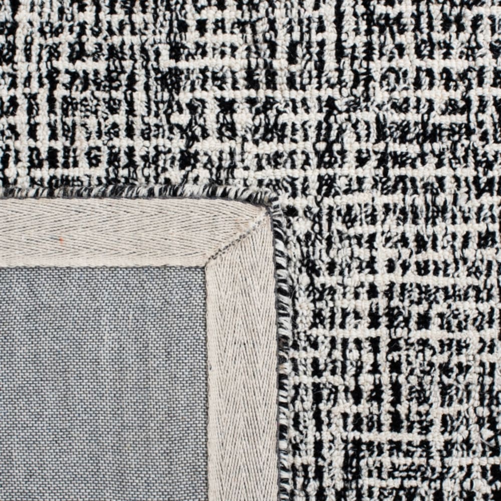Tapis contemporain en laine noir/blanc, 122 x 183 cm — vue 4