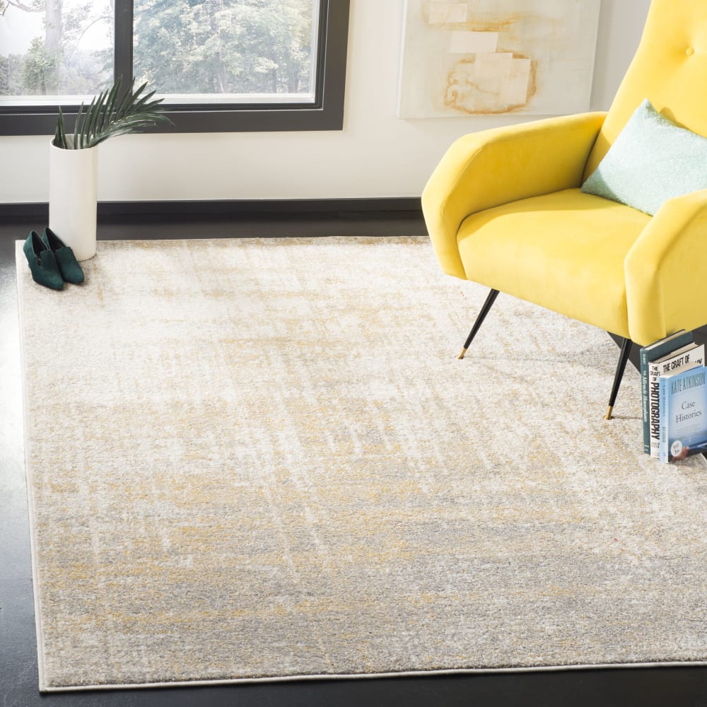 Tapis moderne en polypropylène beige/or, 122 x 183 cm