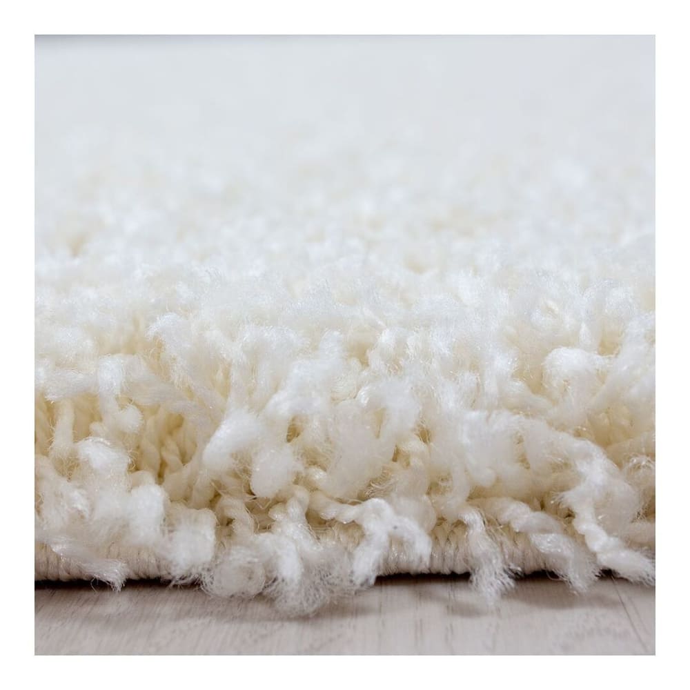 Tapis uni design en polypropylène crème Ø 120