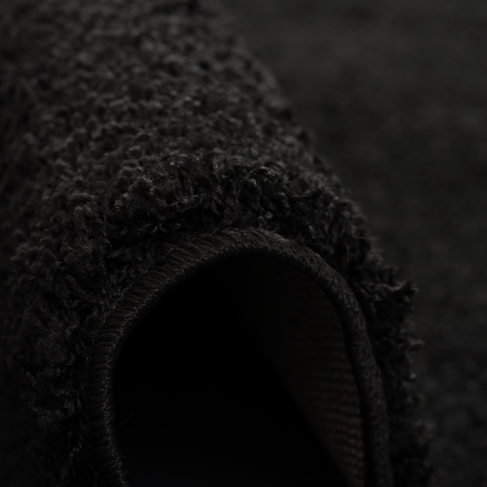Tapis shaggy uni noir 120x170 cm — vue 3