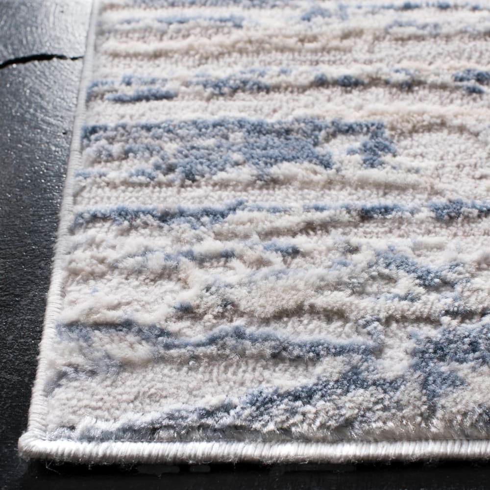 Tapis contemporain en polypropylène blanc/bleu, 66 x 122 cm — vue 4