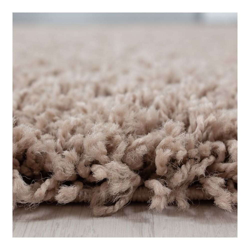 Tapis uni design en polypropylène beige Ø 120