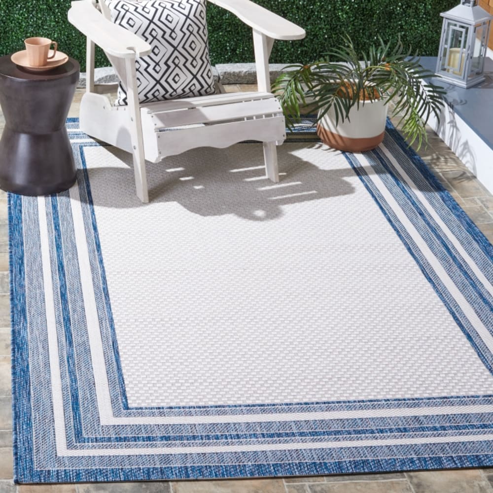 Tapis géométrique en polypropylène blanc/bleu, 122 x 170 cm — vue 3