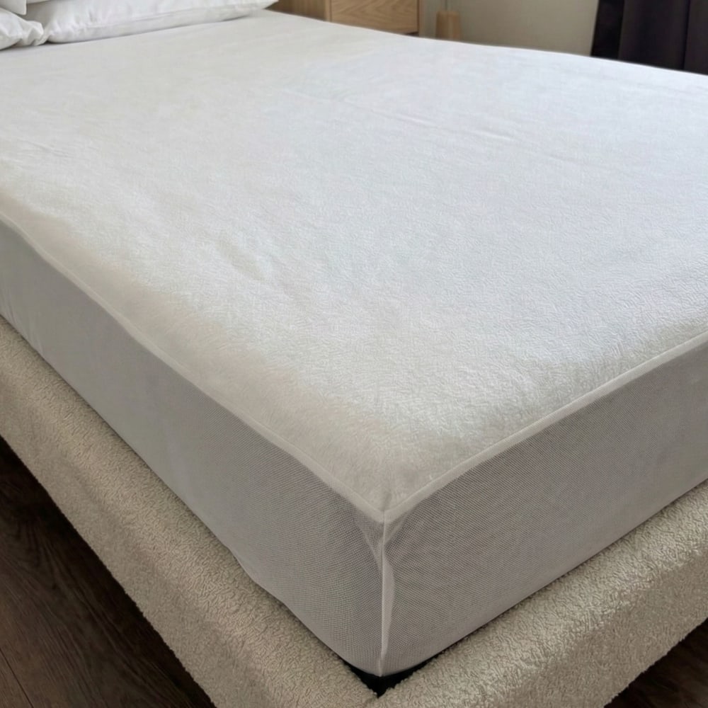Protège matelas bouclette imperméable bonnet 27 120x190 cm