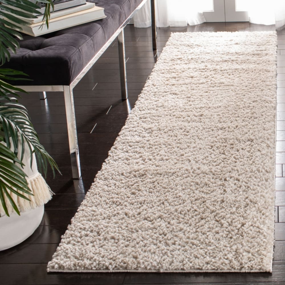 Tapis en polypropylène beige, 69 x 122 cm — vue 3