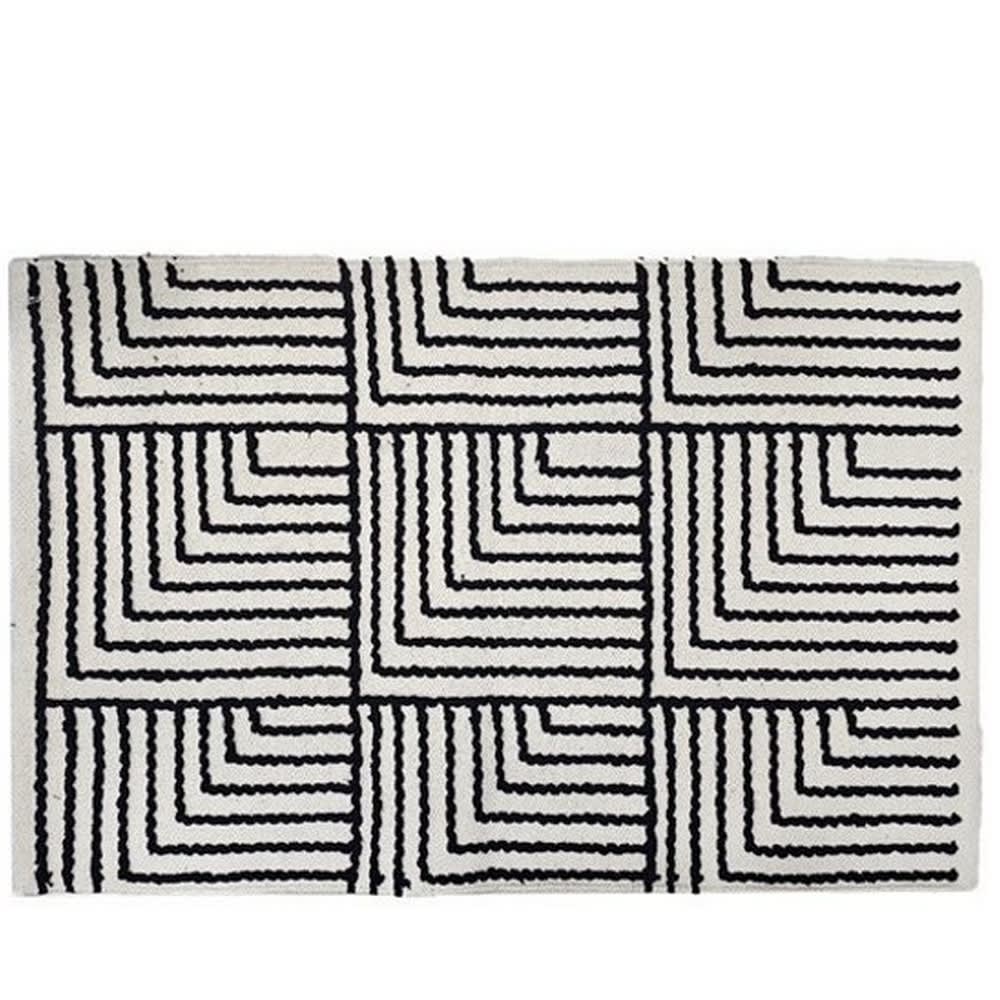 Tapis rectangulaire en coton avec motifs noirs et écrus 90 x 60 cm