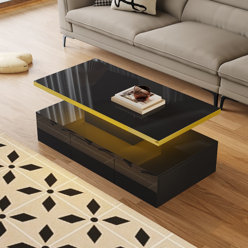 Table basse noire brillante avec bande dorée et tiroirs