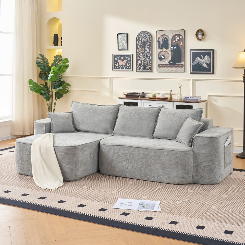 Canapé d’angle modulable en tissu gris avec méridienne, coussins