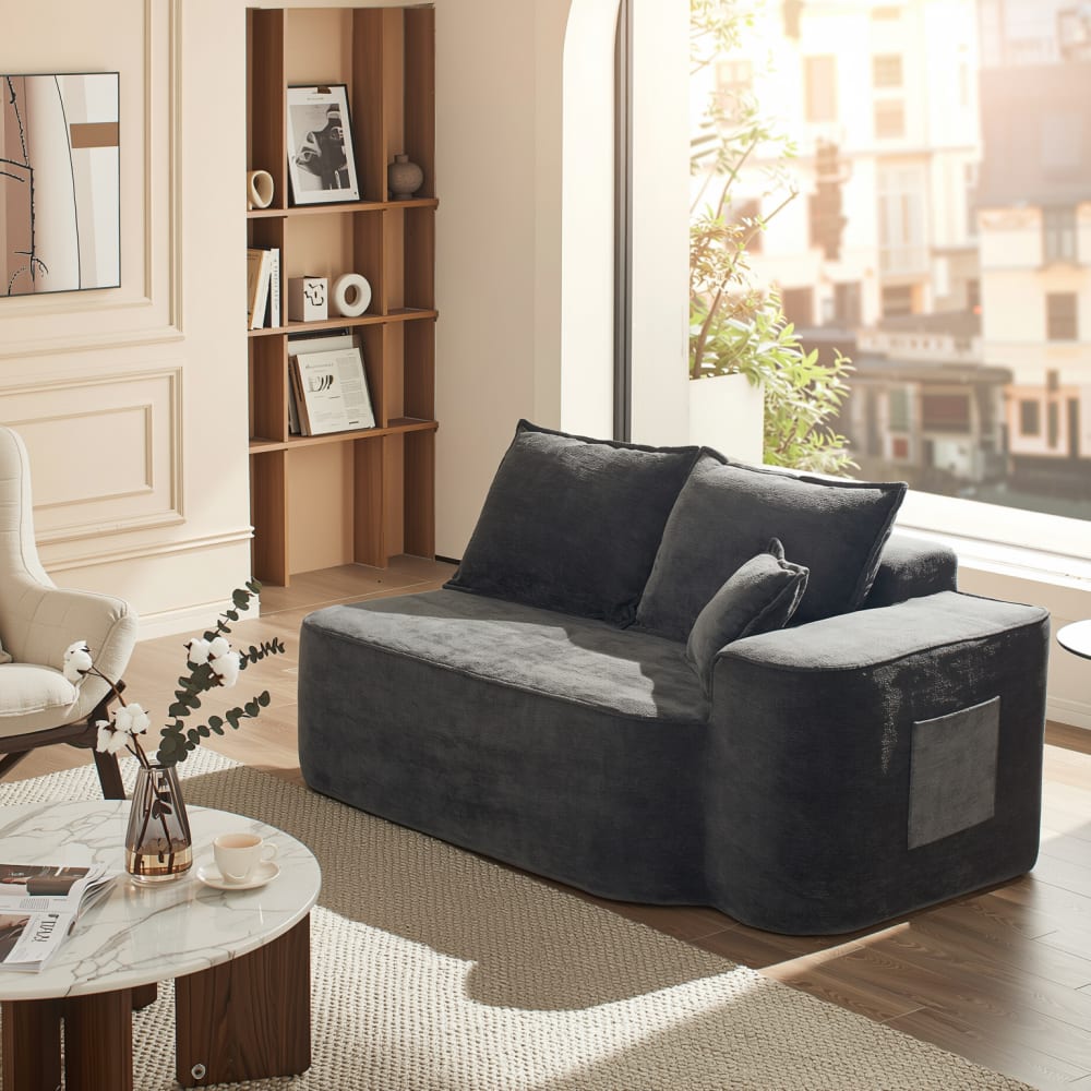 Canapé méridienne 2 places en tissu chenille noir avec coussins