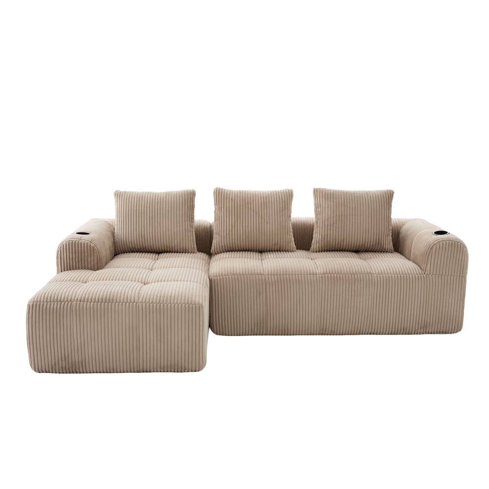 Canapé modulable en velours côtelé beige avec accoudoirs et coussins