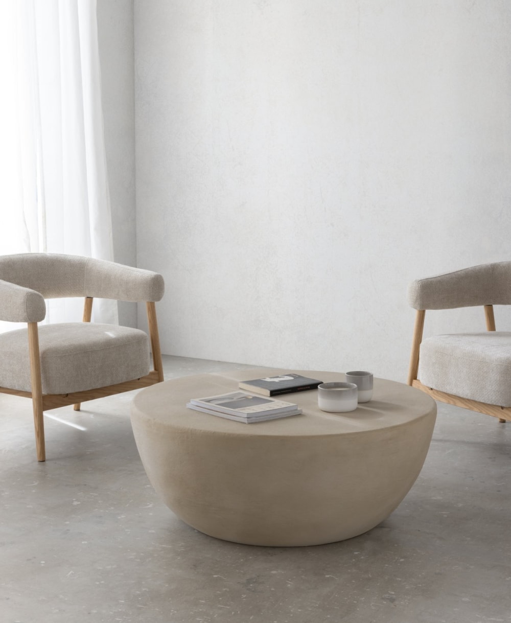 Couchtisch 100 cm Durchmesser aus sandfarbenem Polyresin -