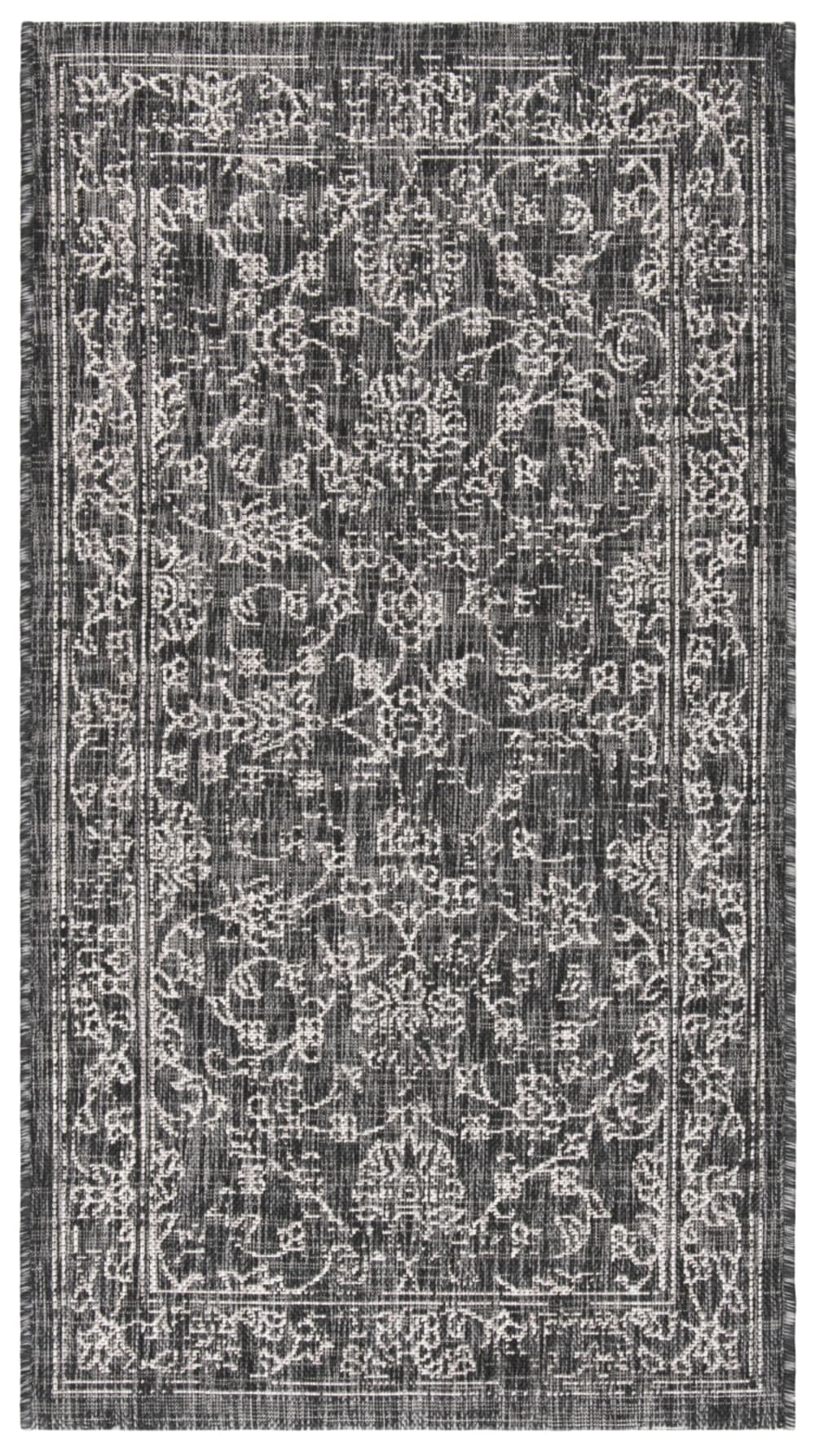 Tapis géométrique en polypropylène noir/blanc, 79 x 152 cm