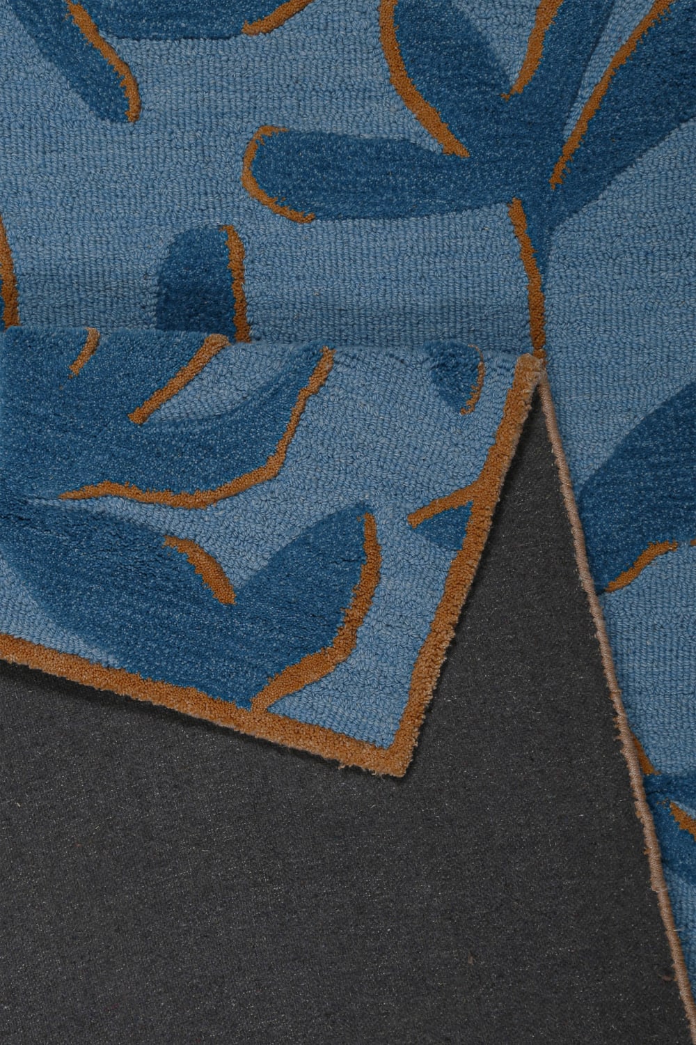 Tapis design floral tufté pure laine bleu et brique 110x170 — vue 4
