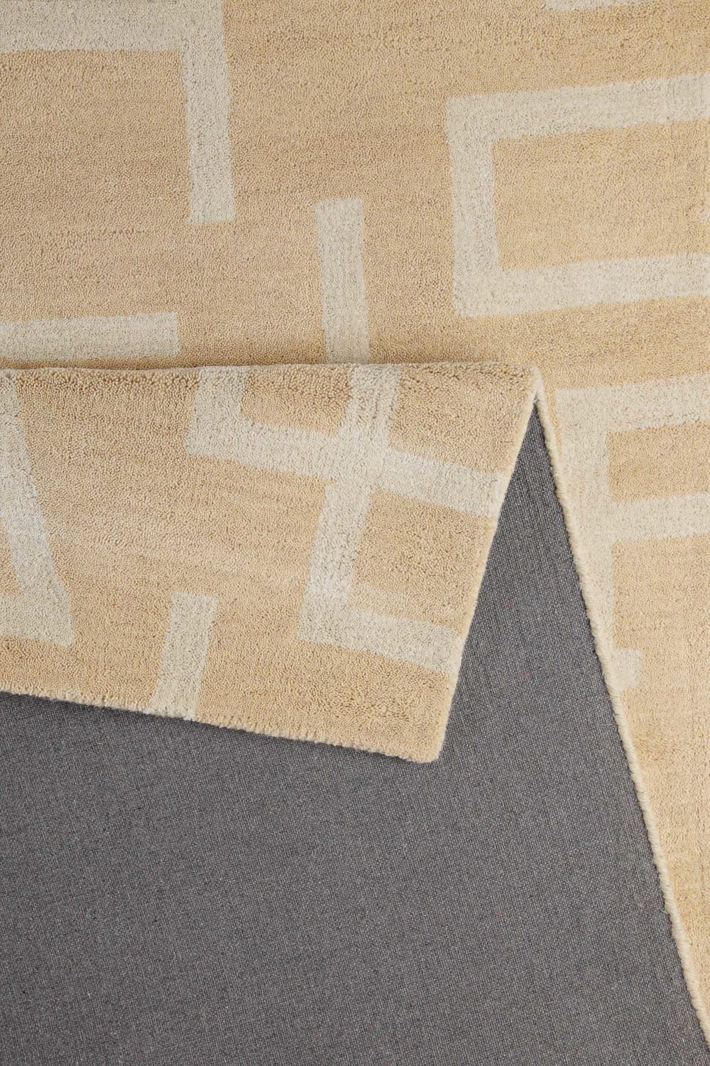 Tapis design minimaliste tufté pure laine sable et ivoire 70x140 — vue 4