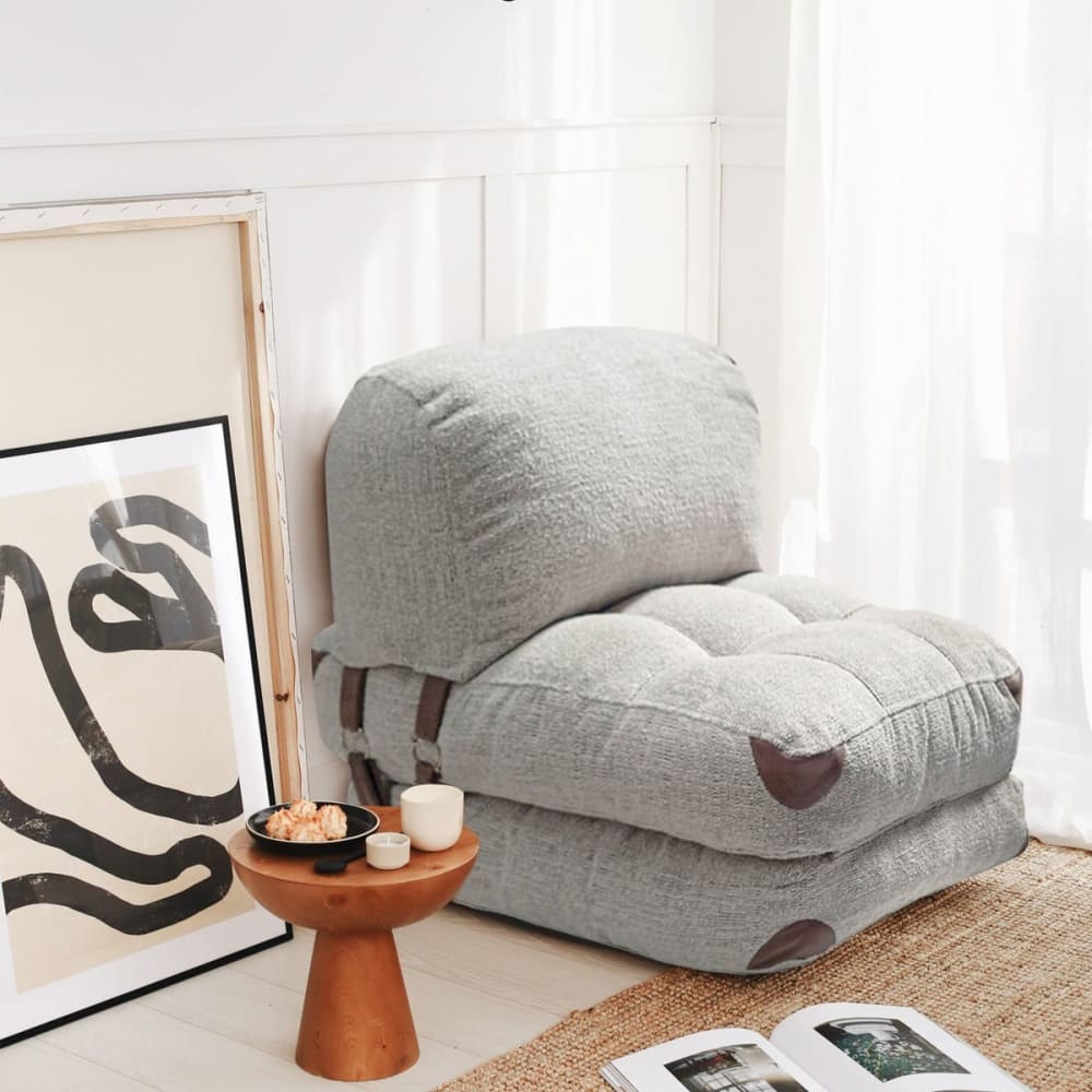 Chauffeuse convertible en tissu teddy gris