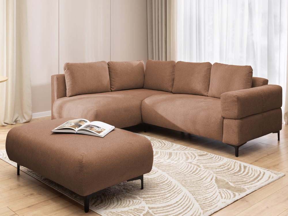 Ecksofa und Hocker mit Schlaffunktion in Bubble-Optik aus