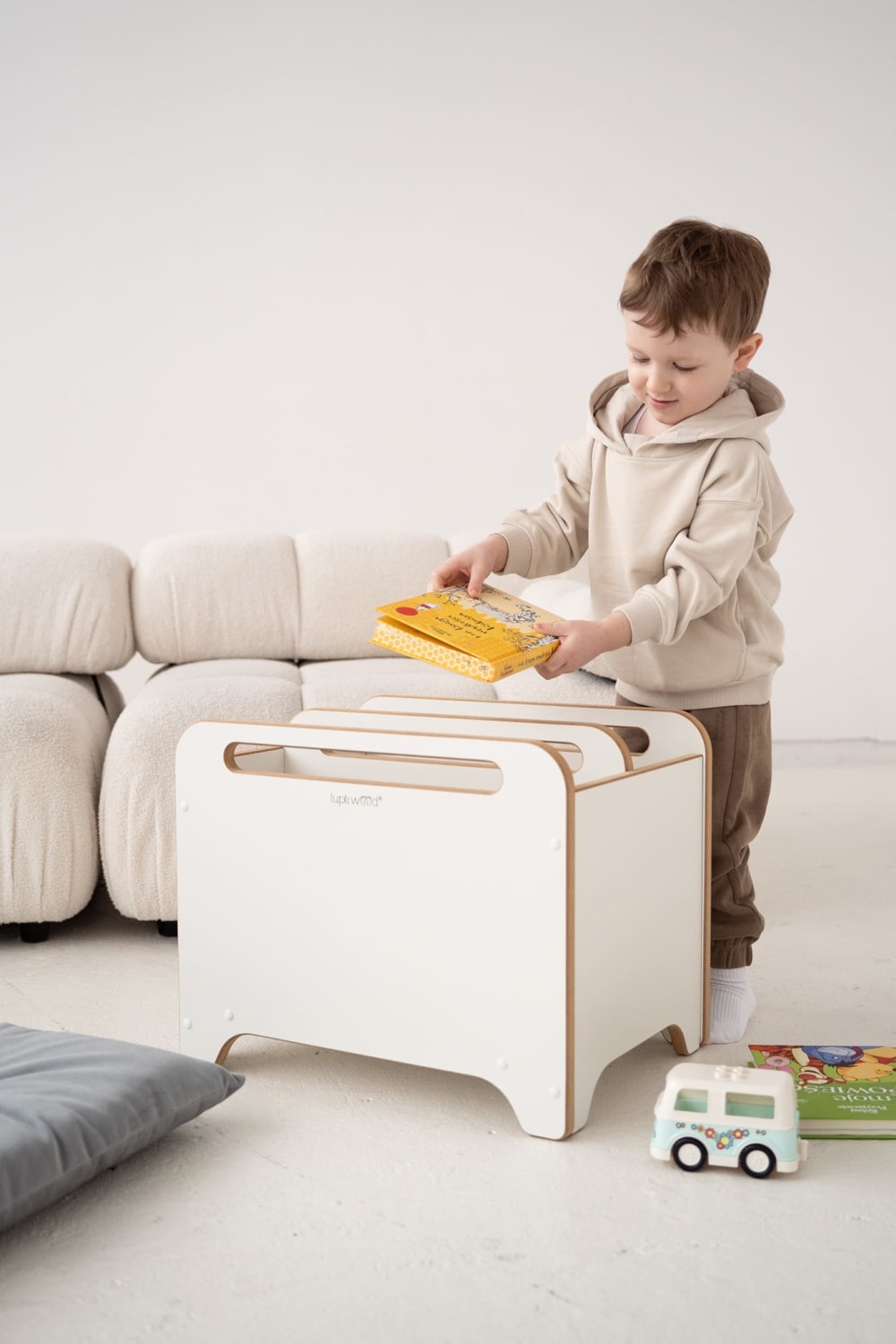 Coffre à jouets sur roulettes pour enfant en bois blanc