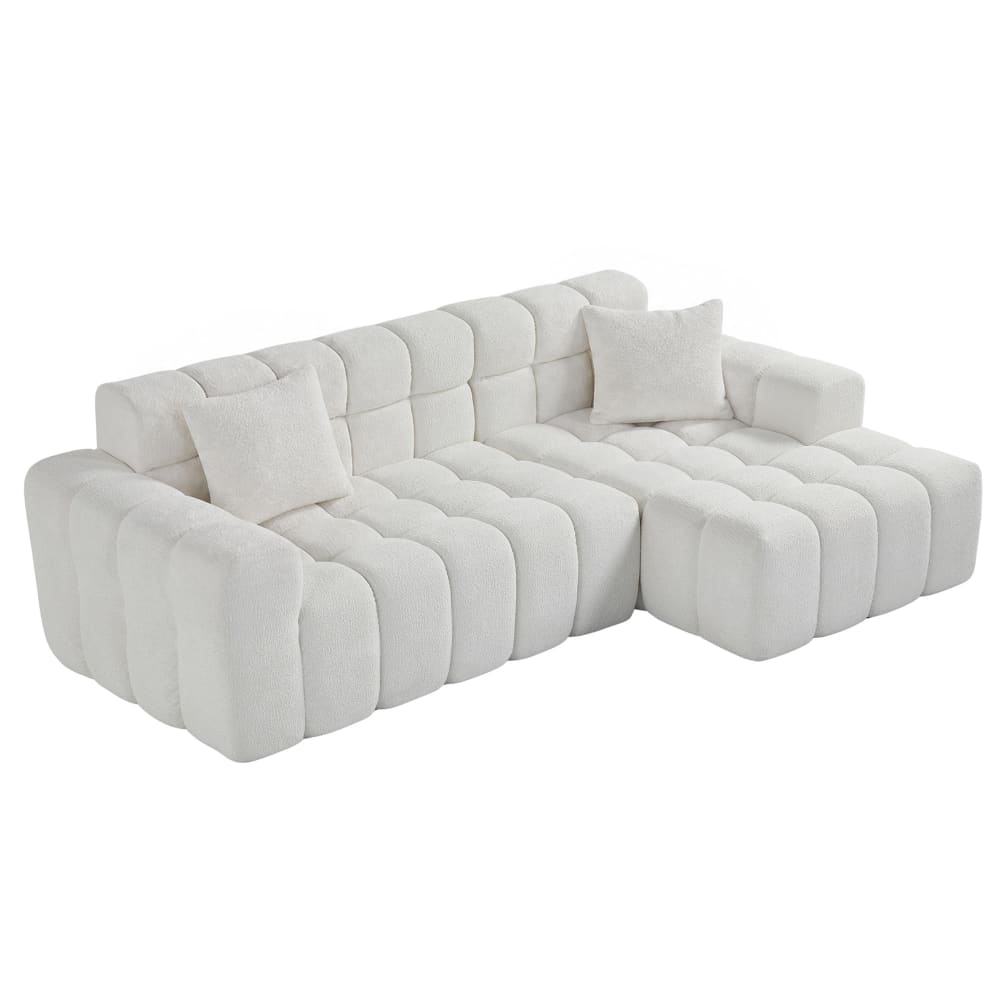 Canapé d'angle modulaire en velours blanc avec coussins
