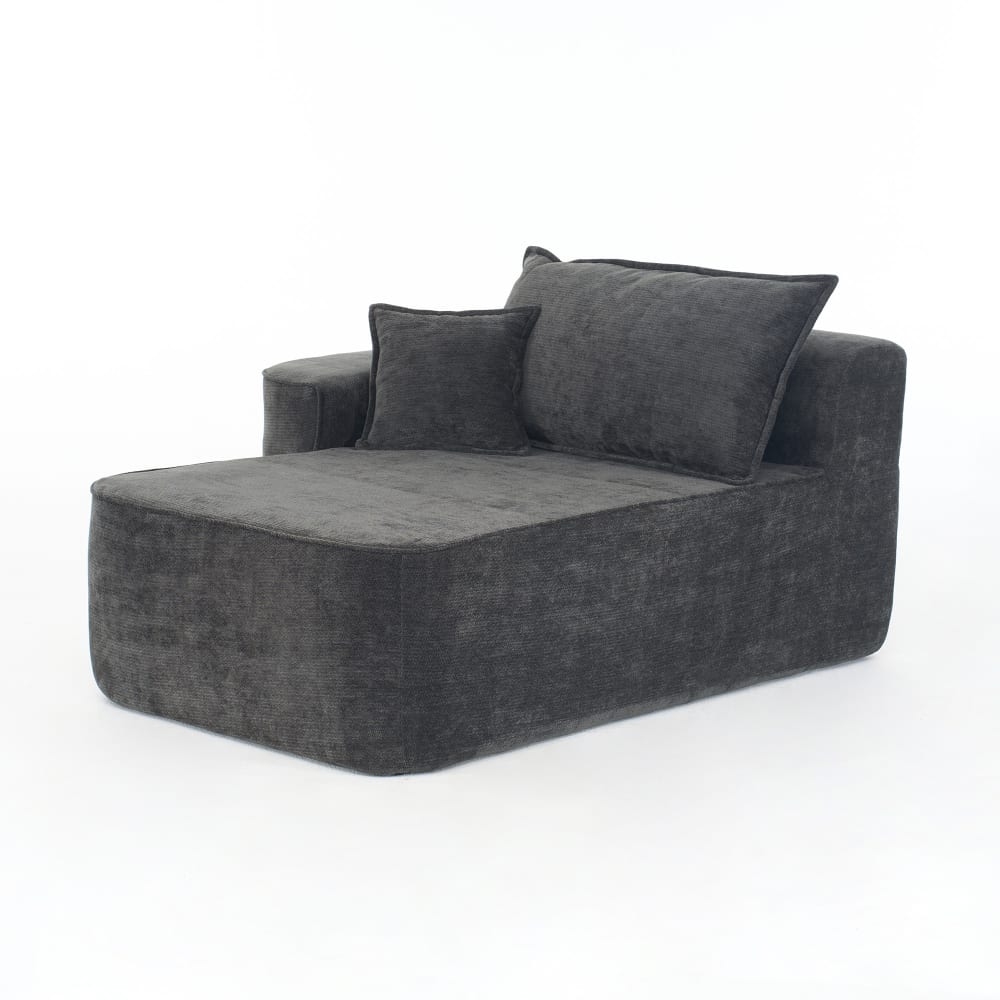 Canapé en chenille noire avec coussin et poches latérales