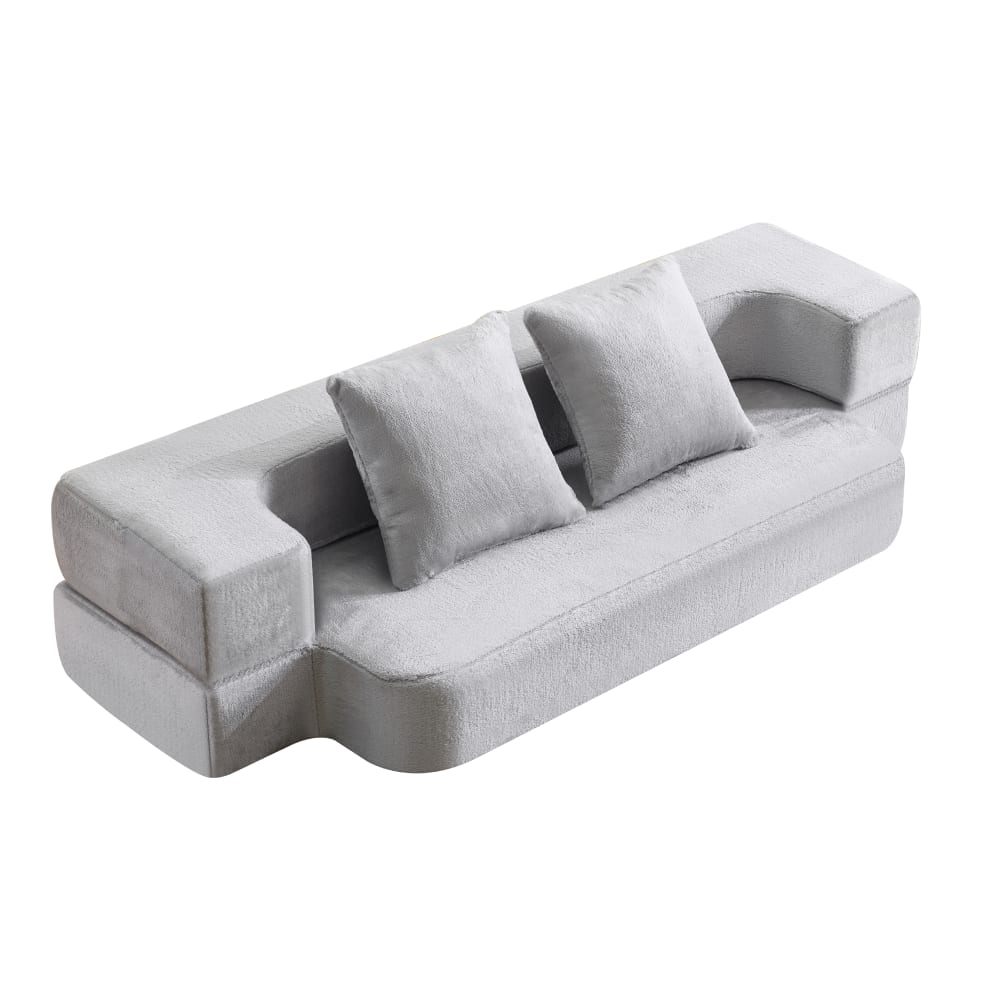 Canapé convertible gris clair avec coussins assortis