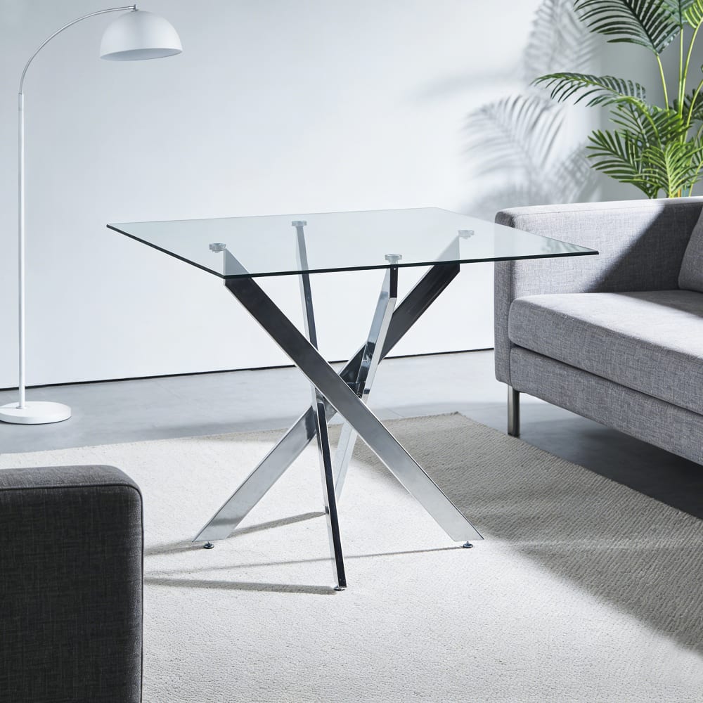 Esstisch mit gekreuzten Metallbeinen und Glas 80x80 cm silber -