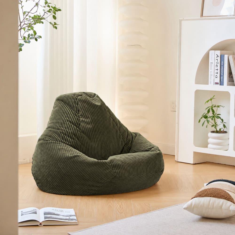 Pouf en velours côtelé vert
