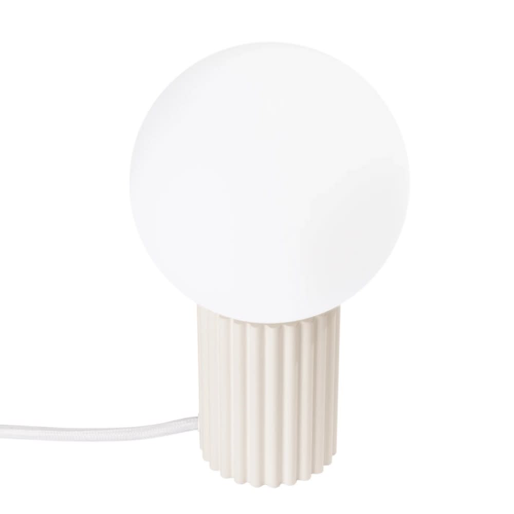 Lampe de table avec relief beige et sphère en verre Lampe de table avec relief beige et sphère en verre