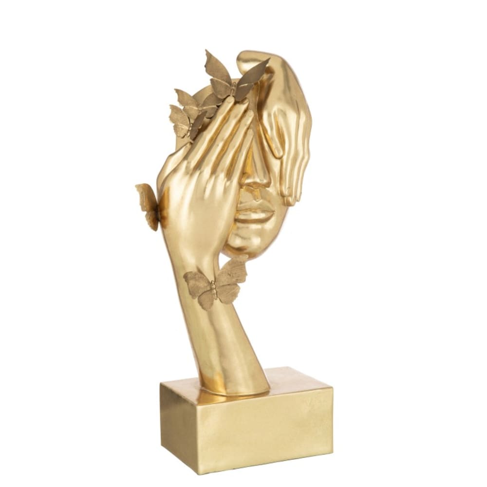 Visage dans main en résine
