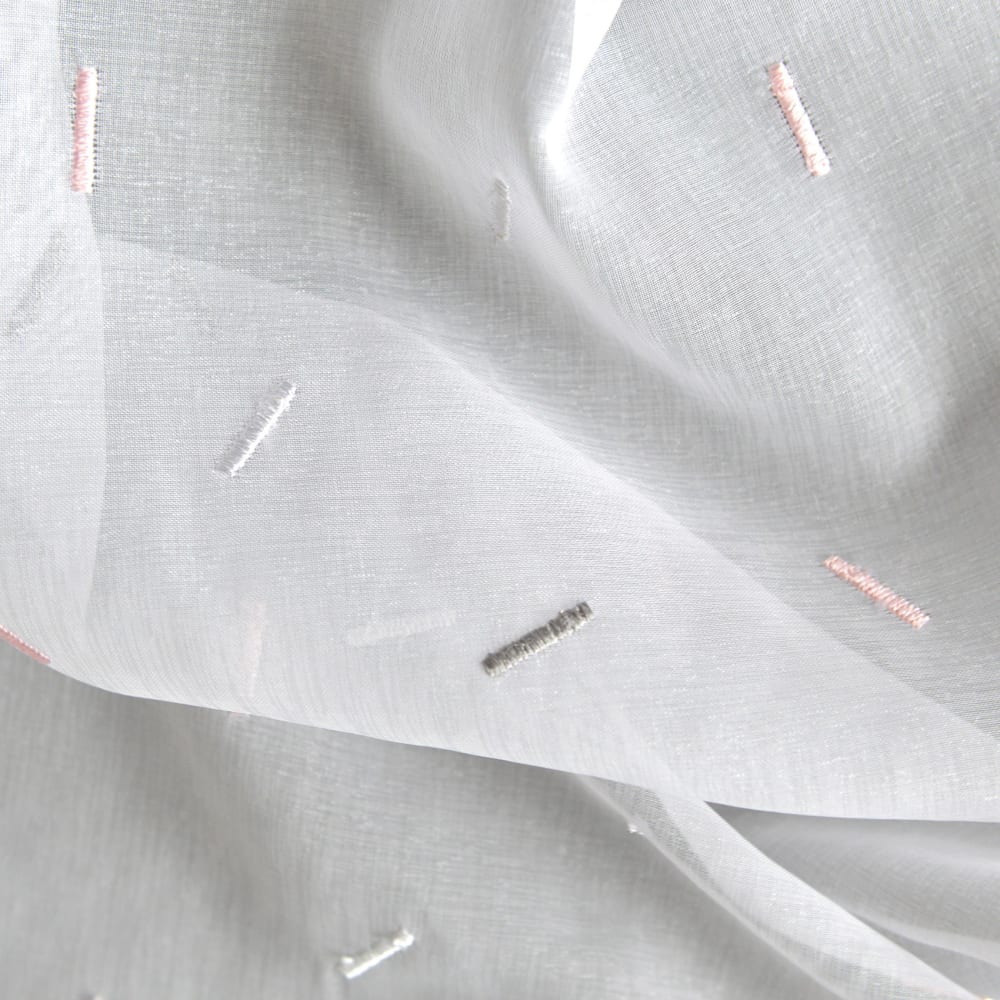 Tissu brodé petits bâtonnets polyester rose clair 3 m