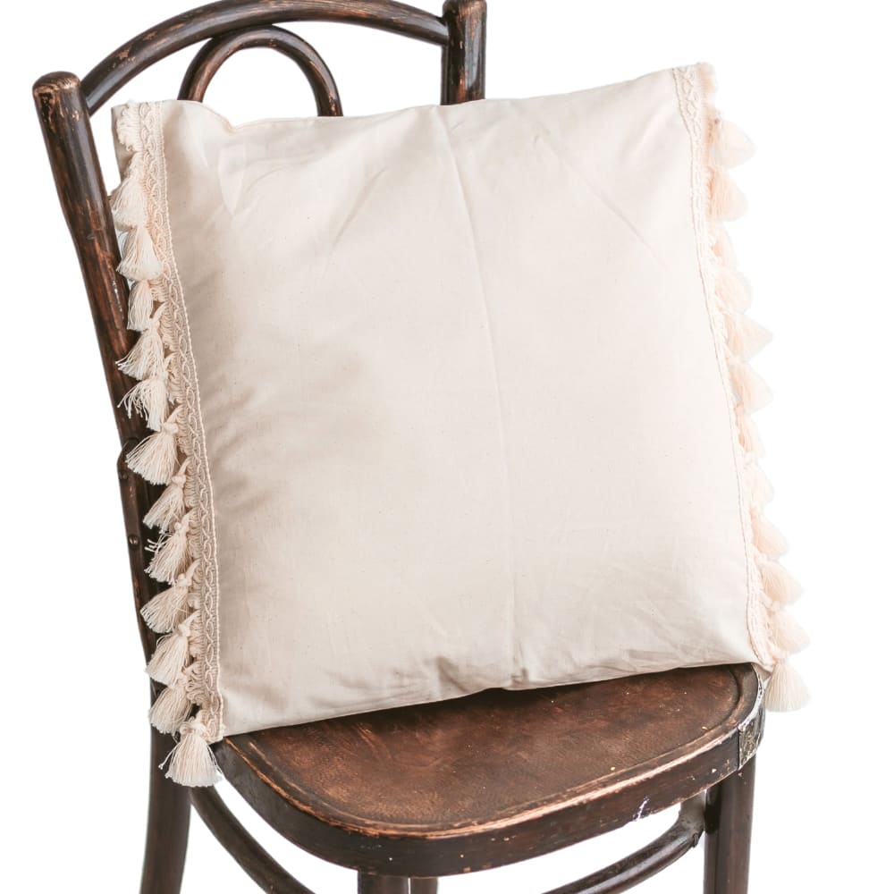 Coussin décoratif avec gland