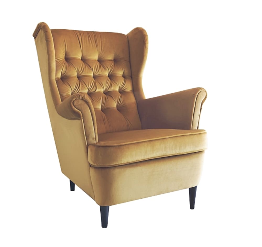 Fauteuil bergère capitonné