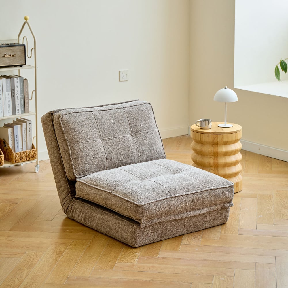 Fauteuil chauffeuse convertible en tissu gris