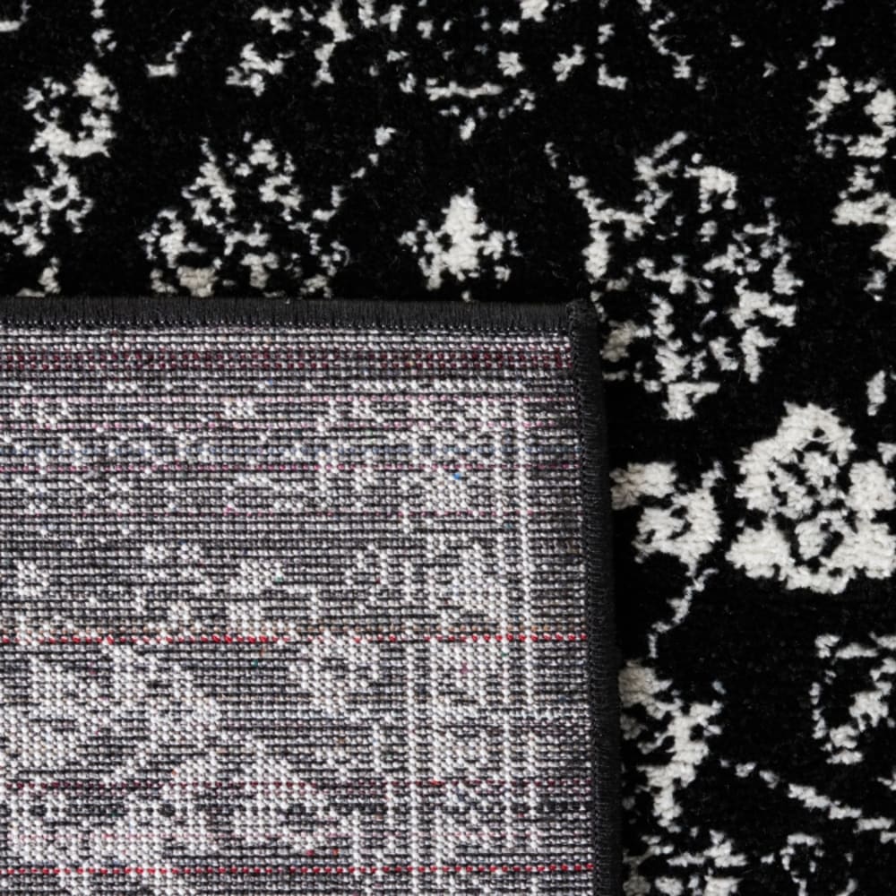 Tapis vintage patiné en polypropylène noir/blanc, 91 x 152 cm — vue 4