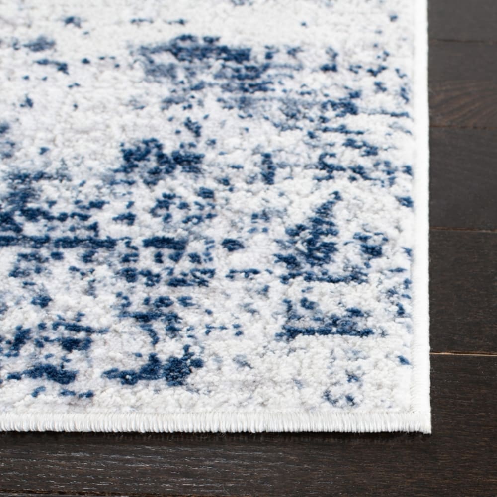 Tapis contemporain en polypropylène blanc/bleu, 183 x 244 cm — vue 4