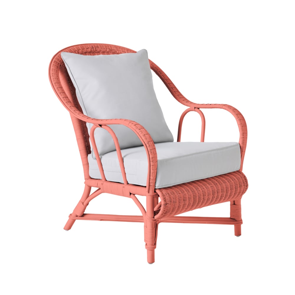 Fauteuil rotin laqué corail Fauteuil rotin laqué corail