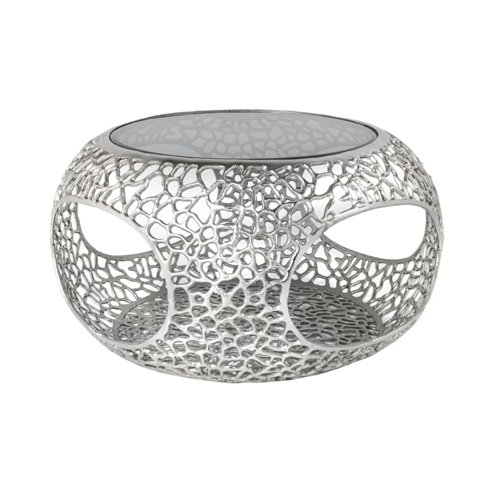 Table basse ronde en aluminium ajouré argenté et en verre 74x40x74cm Table basse ronde en aluminium ajouré argenté et en verre 74x40x74cm