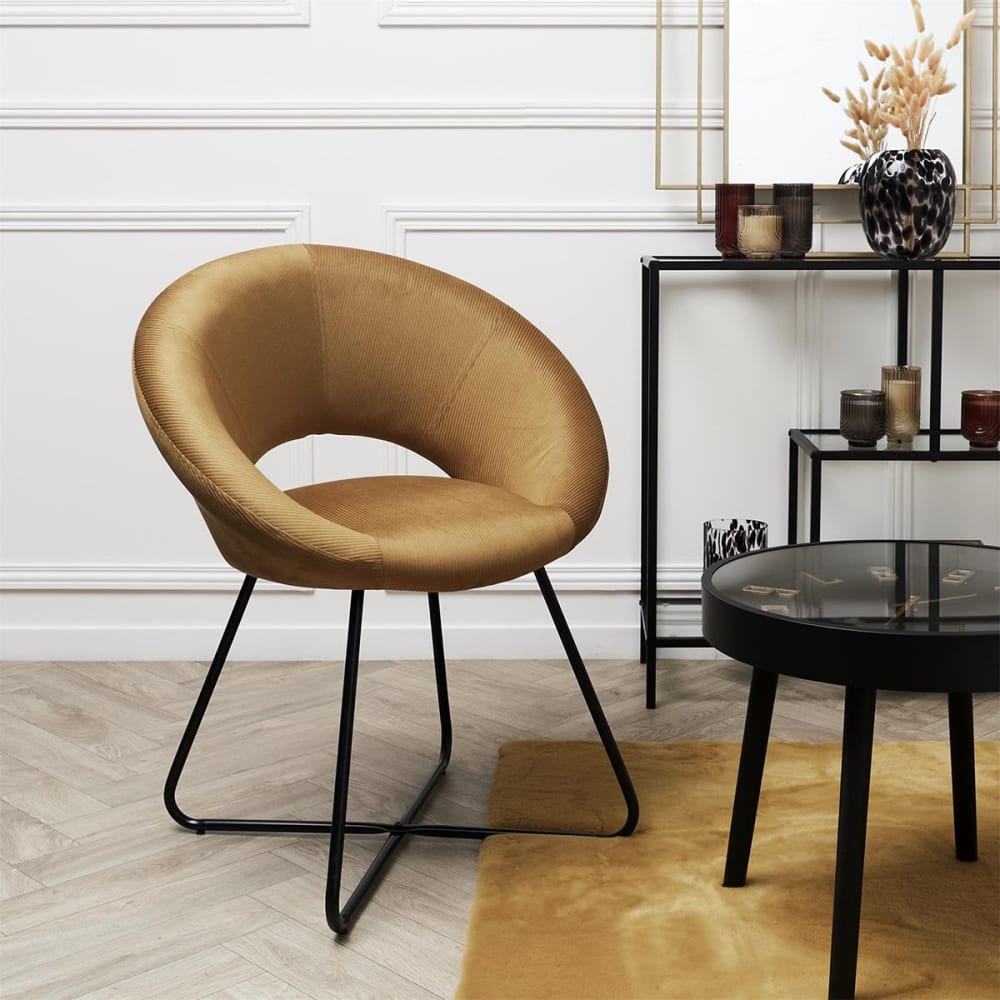 Fauteuil rond ajouré en velours côtelé ocre