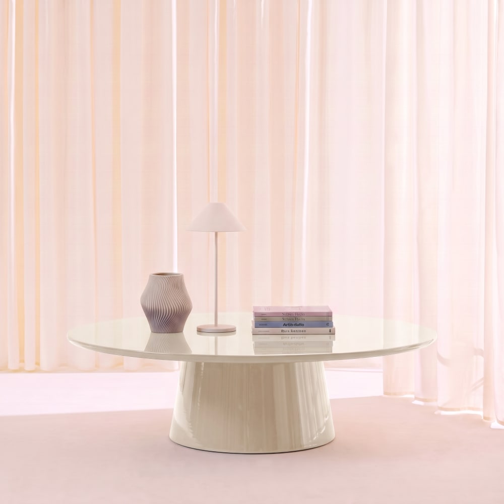 sweeek Ovaler Couchtisch creme mit Hochglanz-Oberfläche style modern Beige Spanplatte