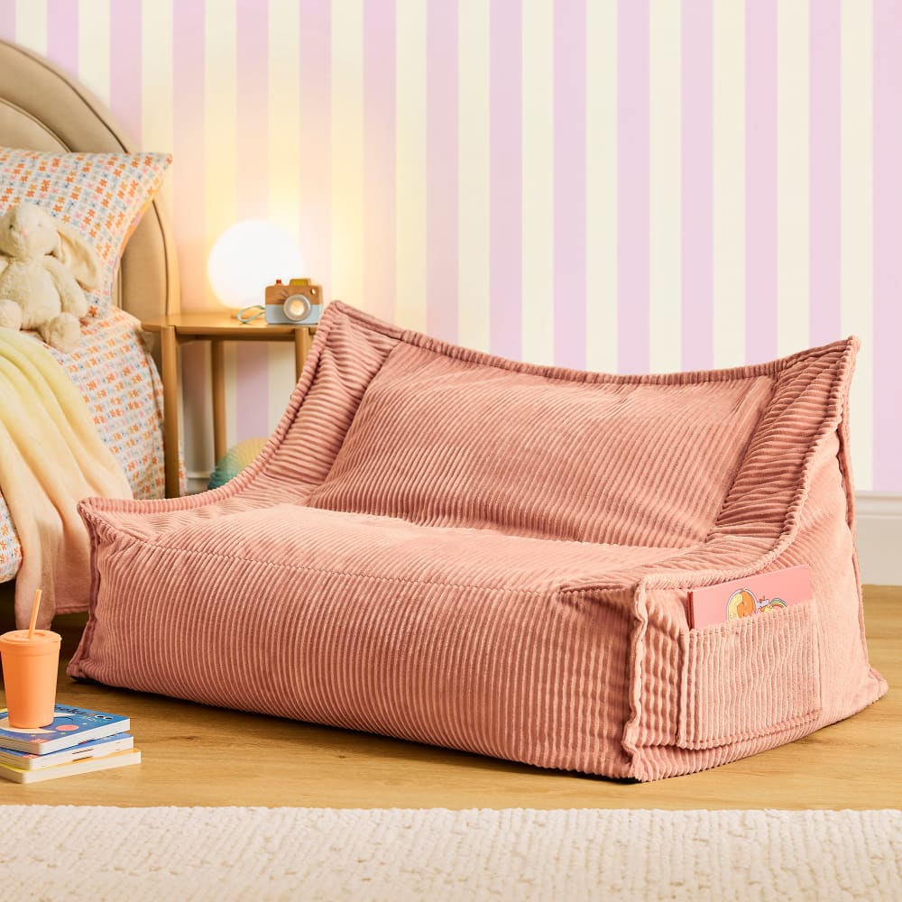 Pouf canapé enfant 2 places en velours côtelé rose aube