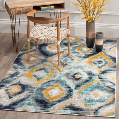 Tapis bohème chic en polypropylène bleu/multicolore, 155 x 231 cm