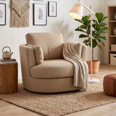 Fauteuil pivotant à 360° en tissu beige